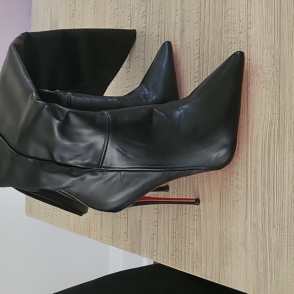 Beautiful thigh high boots. Never worn. Price reflects authenticity. - Picture 1 of 3